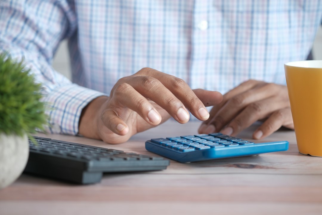 Calculator used to compare debt payments with monthly income