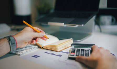 Calculator with finance materials for simple and compound interest