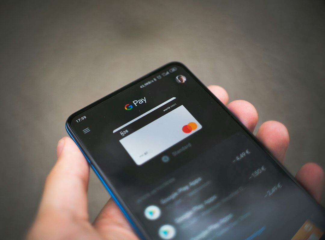 Mobile phone with payment screen illustrating an accidental wrong beneficiary transfer