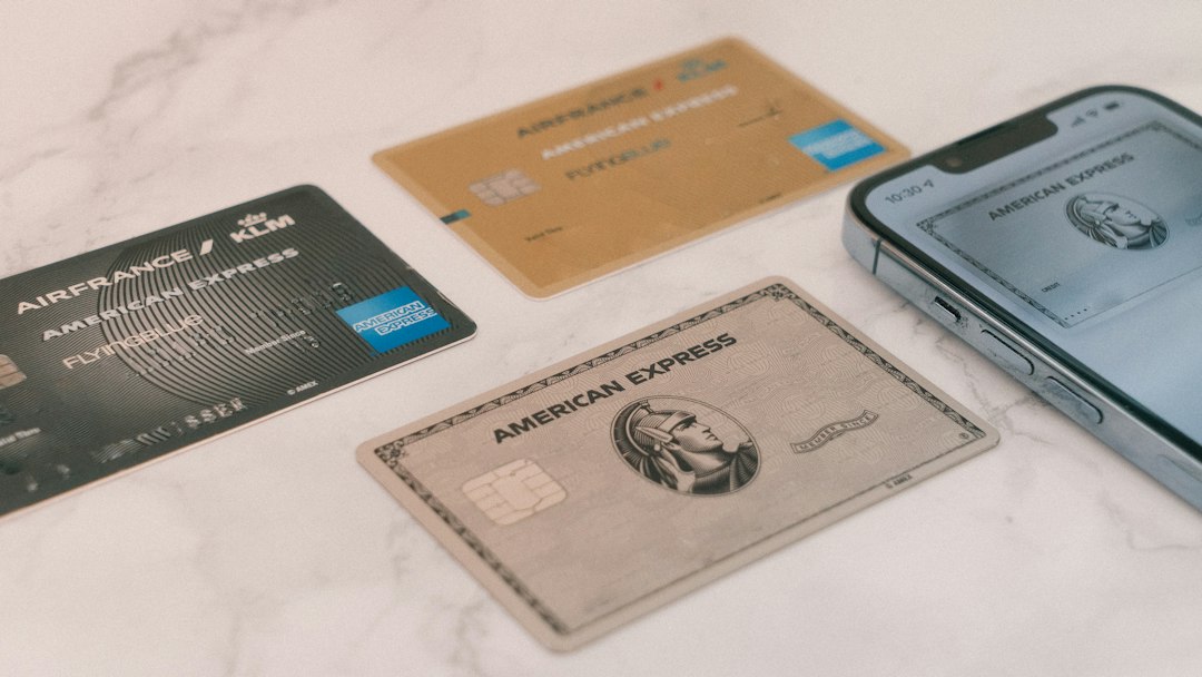 Credit cards next to a smartphone representing an online purchase refund