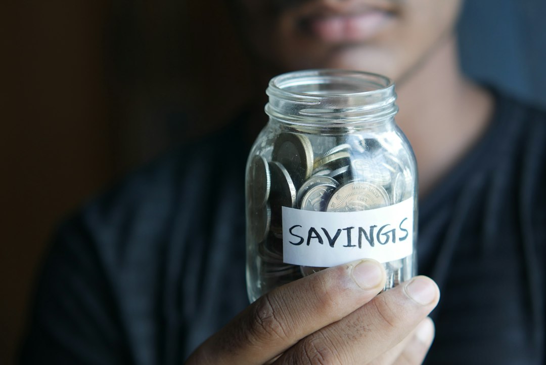 Jar marked savings illustrating fixed deposit ladder strategy